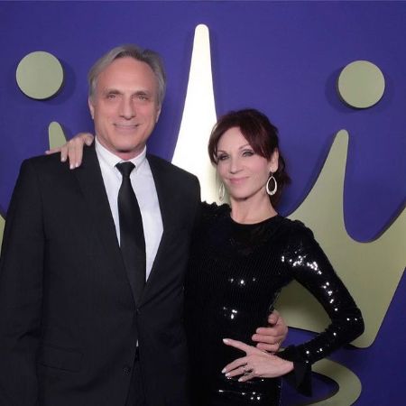 Marilu Henner posing with her hubby Michael.